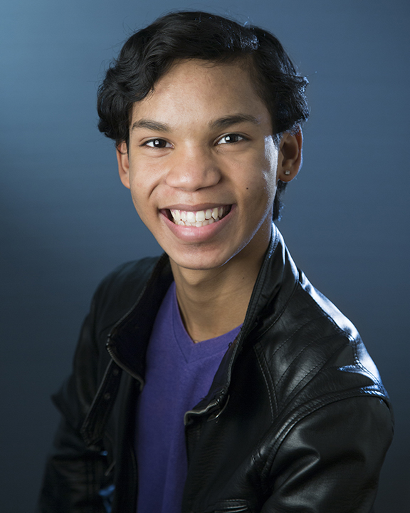 Professional headshot of a young man